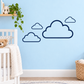 Vinyl wall decal set with four navy cloud outline designs, white centers