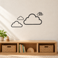 Four floating cloud outline wall decals with small orbit swirl accents