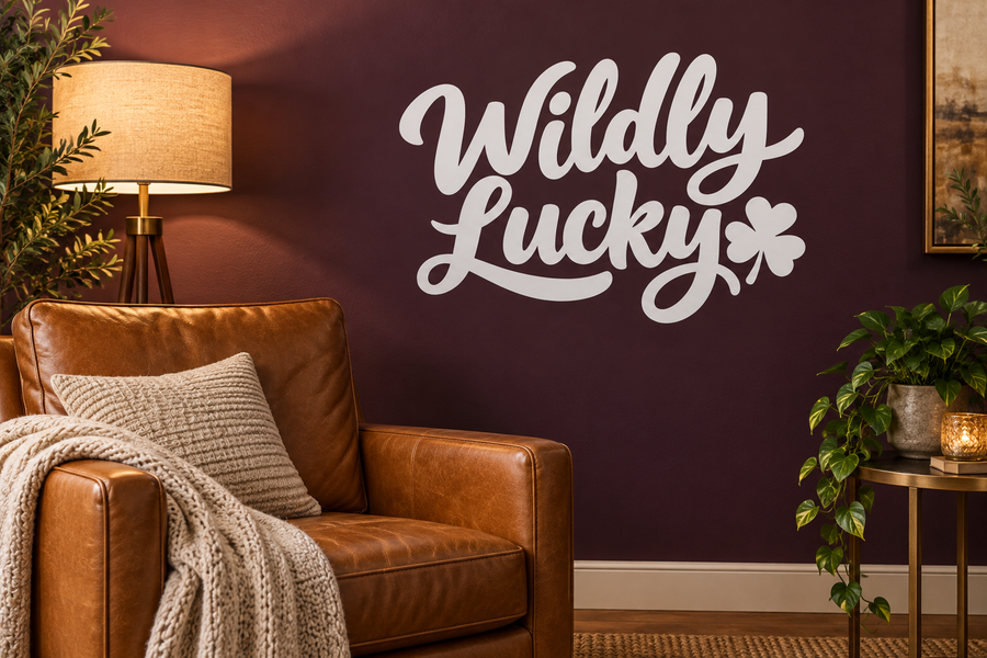 Wildly Lucky clover vinyl wall decal, cursive lettering with clover icon.