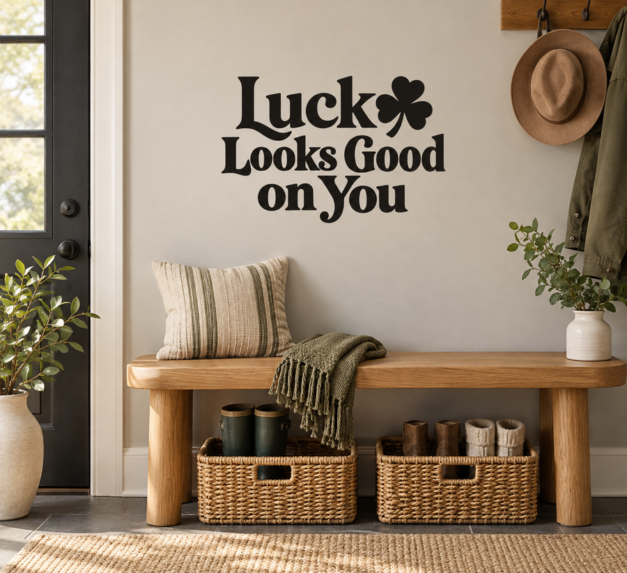 Luck Looks Good on You vinyl decal with clover graphic, black lettering on light surface