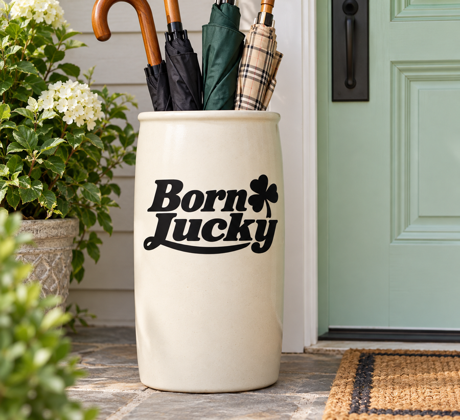 Born Lucky vinyl decal with clover icon, black script text design