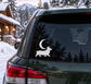 Vinyl decal: black crescent moon with corgi silhouette on car window