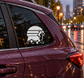 Corgi vinyl decal on car window, white graphic with black outline