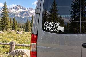 Corgi Mom vinyl decal on gray car window, black cursive text with heart and corgi