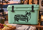 Corgi vinyl decal with “Small Paws Big Personality” on a green cooler lid