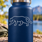 Walking mountain lion outline vinyl decal with alert eyes, white on dark blue