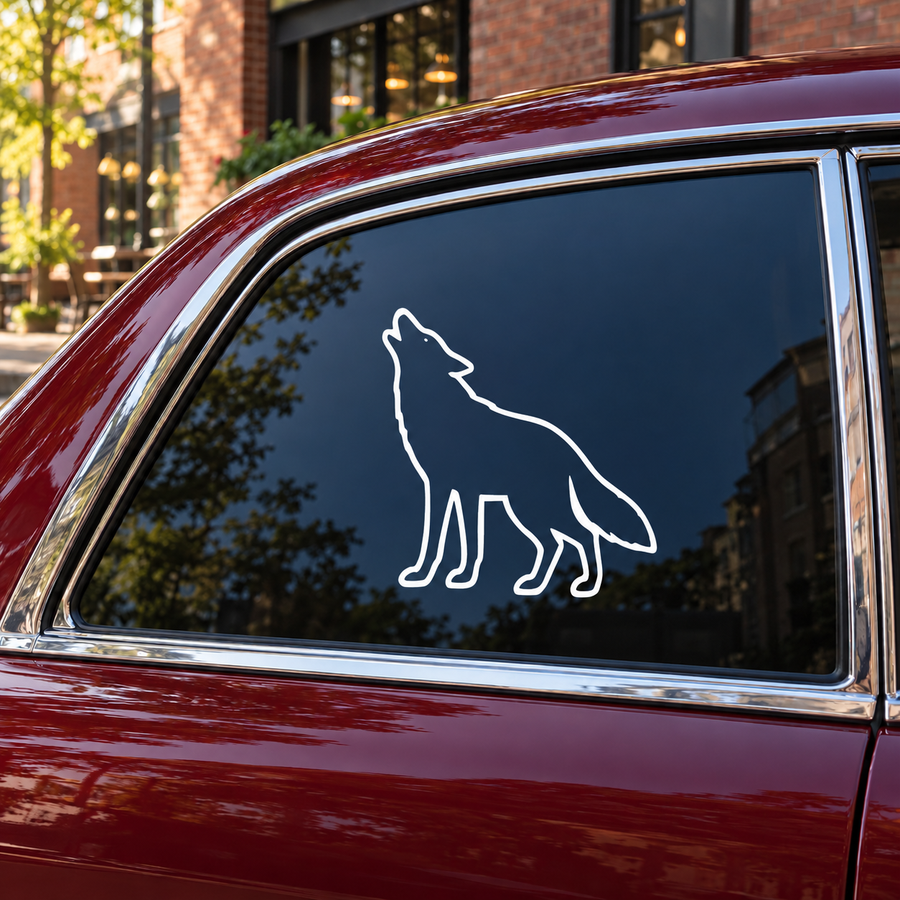 Standing coyote outline vinyl decal, white line art on car window