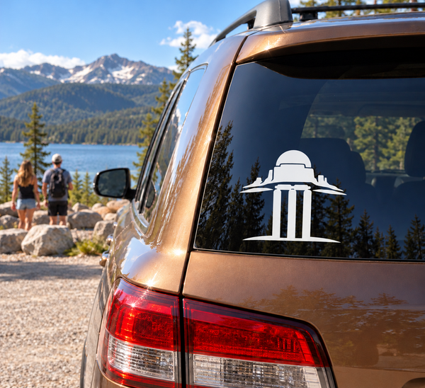 Vinyl decal of cricket wicket canyon building on car rear window