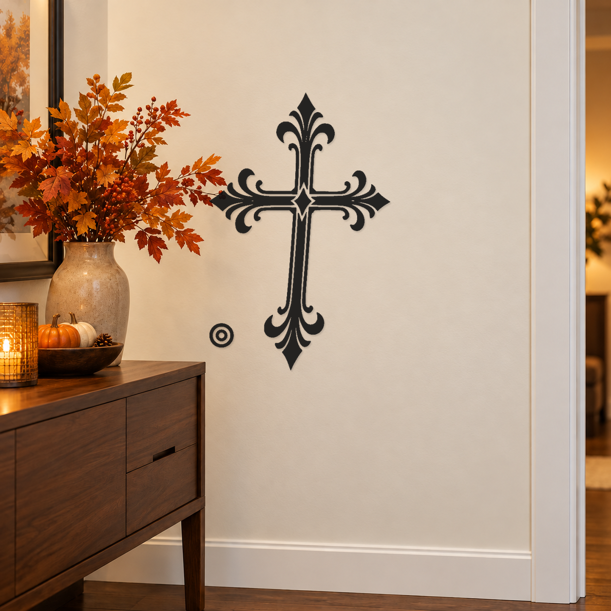 Ornate black cross vinyl wall decal with double orbit ring accents