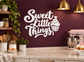 Sweet Little Things vinyl decal with cupcake icon text on wall