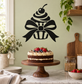 Black cupcake and bow vinyl wall decal with frosting swirl and ribbon bow