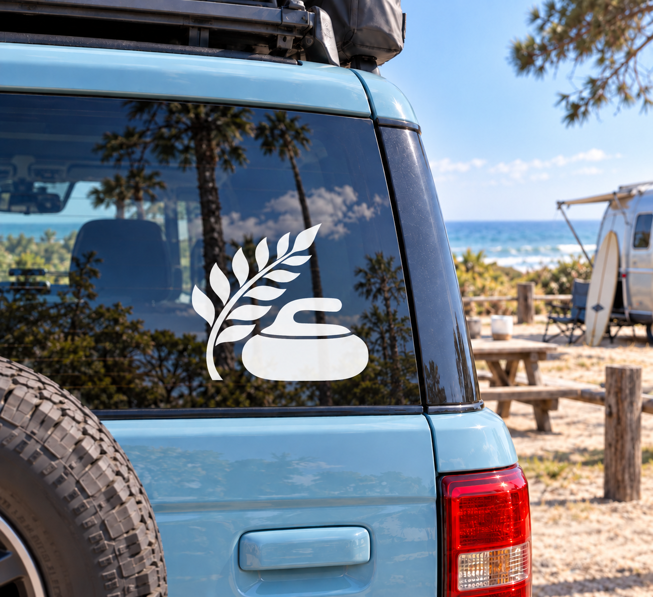 White fern slide vinyl decal on car window glass, leafy arch design