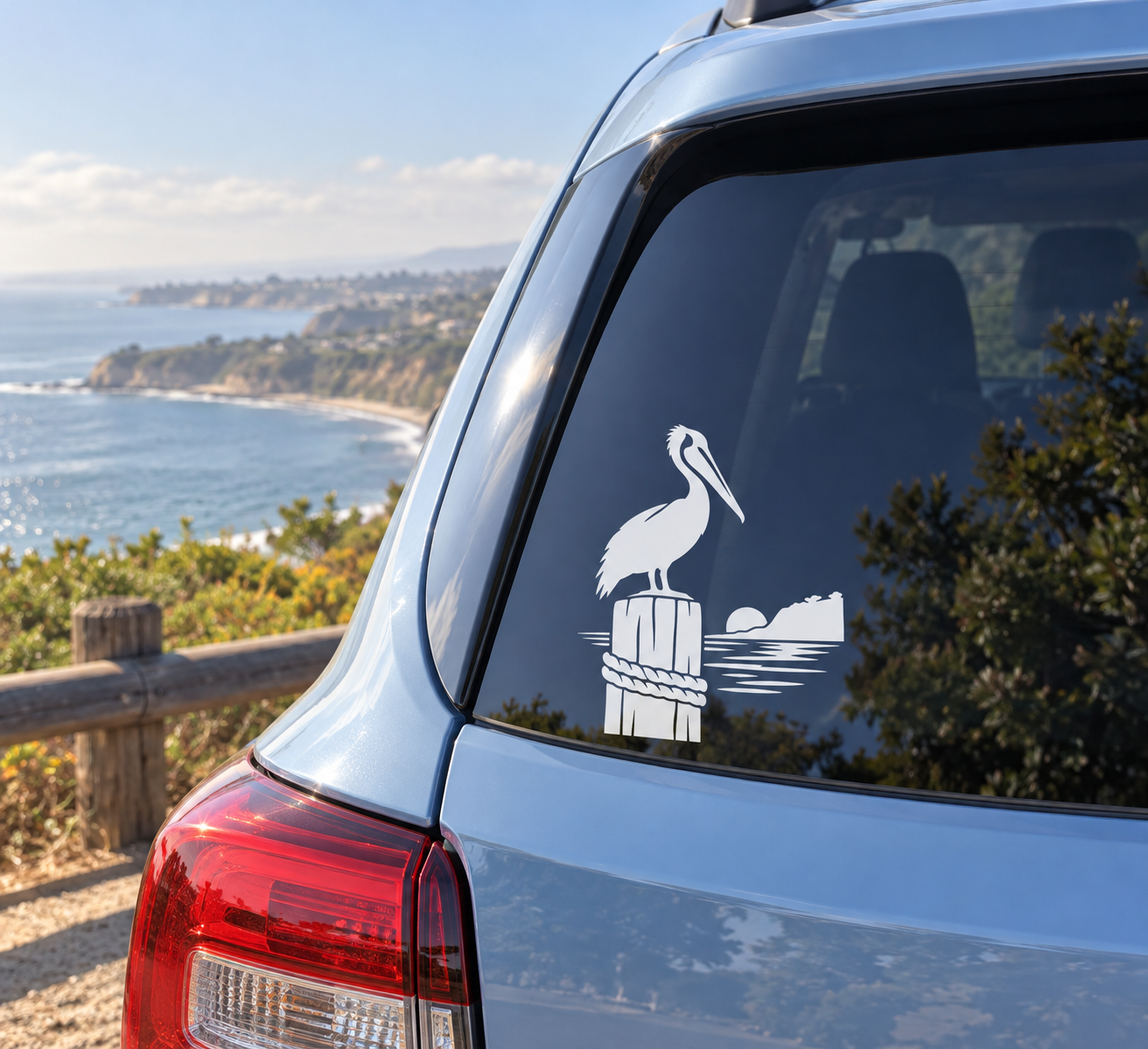 Pelican harbor vinyl decal on car window, white bird over dock and waves