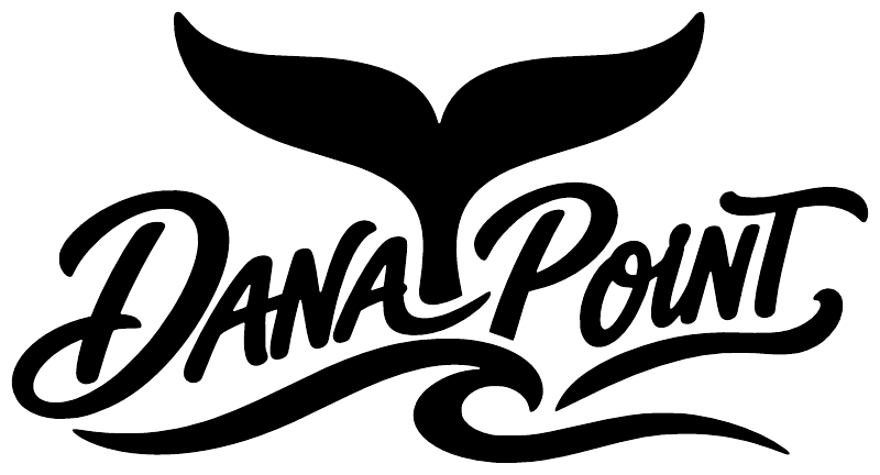 Dana Point vinyl decal lettering with black emblem, shown on white background