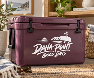 Dana Point Good Days vinyl decal on purple cooler, white coastal logo and text