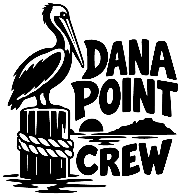 Pelican vinyl decal with Dana Point and Crew lettering in black and white
