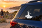 Flamenco dancer vinyl decal on car rear window, white silhouette figure in dress.
