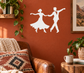 Ballroom turn dance vinyl decal with white silhouettes of twirling dancer and partner