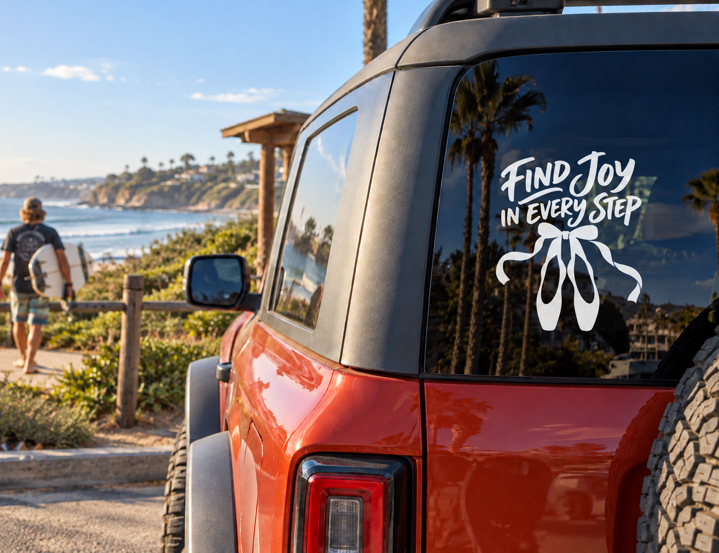 Vinyl decal with white "Find Joy in Every Step" text and bow on car window