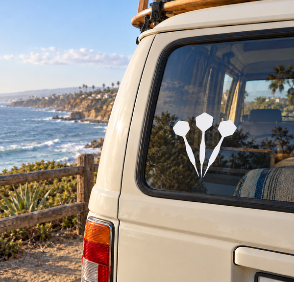 Triple rhythm darts vinyl decal on car rear window, three black arrow-shaped dart icons