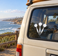 Triple rhythm darts vinyl decal on car rear window, three black arrow-shaped dart icons