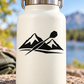 Black mountain climber-style vinyl decal graphic on a white bottle surface