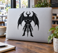 Winged demon vinyl decal, black bat-like wings and spiked armor silhouette