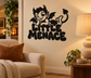 Black vinyl wall decal with cute demon boy holding trident and text