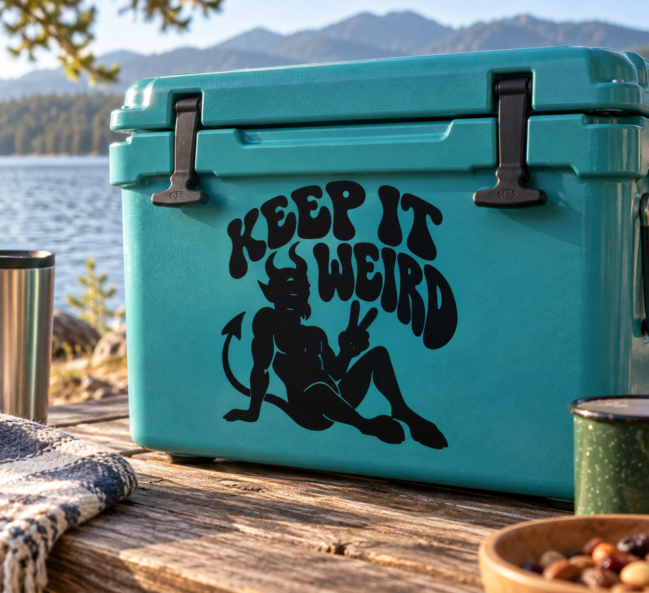 Black demon and "Keep It Weird" vinyl decal on teal cooler