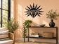 Black sunburst vinyl decal with geometric diamond center