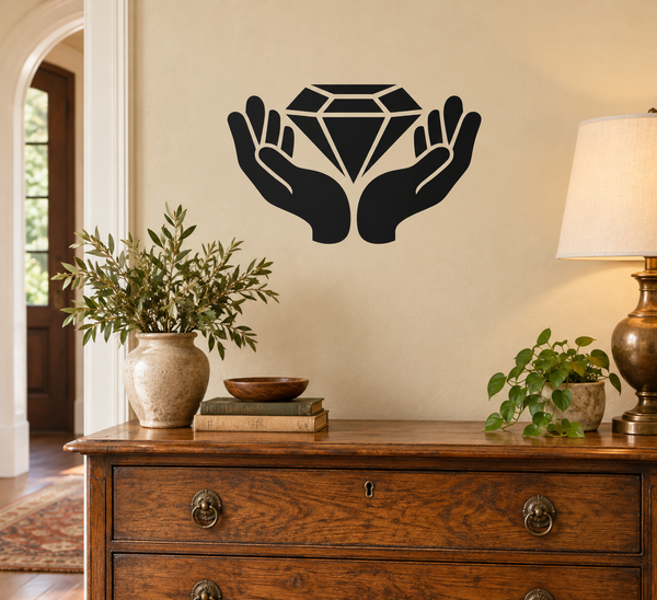 Vinyl decal of open hands holding a faceted diamond silhouette