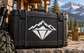 Mountain and diamond vinyl decal on black case with white mountain and diamond