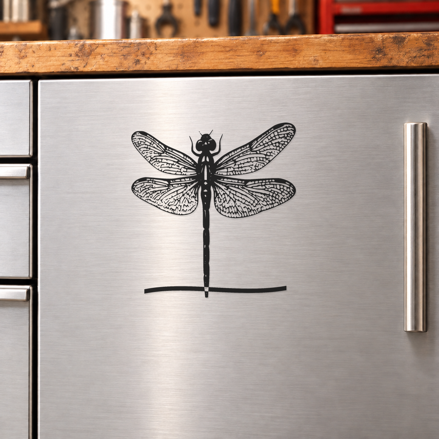 Black dragonfly vinyl decal with detailed wings and long tail, centered design