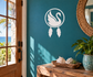 Swan dreamcatcher vinyl decal with circular ring and two hanging feather shapes
