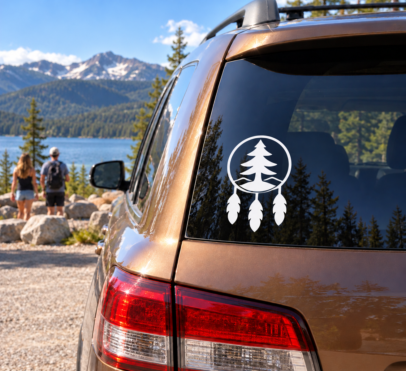 Vinyl dreamcatcher decal with circular pine tree and three hanging feathers