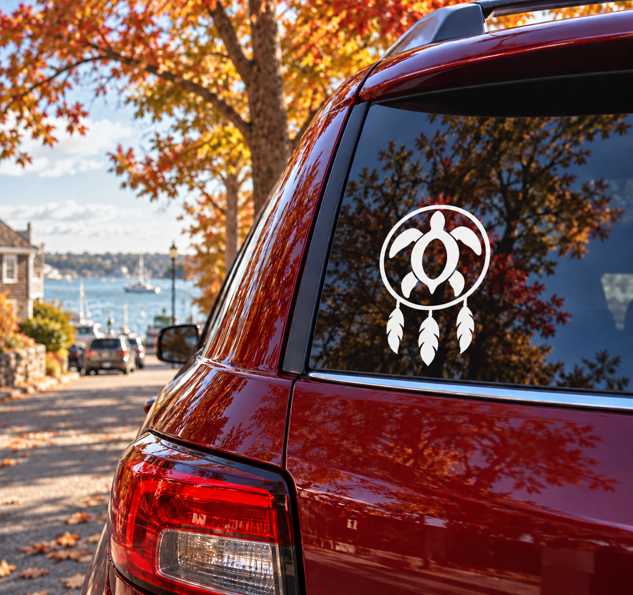 Sea turtle dreamcatcher vinyl decal on car window: black and white turtle with feathers