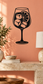 Vinyl drink decal of a stemmed glass with citrus slices and ice cubes