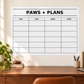 White dry-erase pet care log panel with PAWS + PLANS header and task table