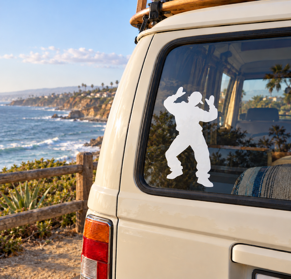 White vinyl decal of a dancing figure with raised hands on a car window