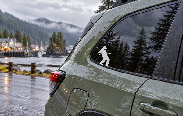 White dancing figure vinyl decal on car side window