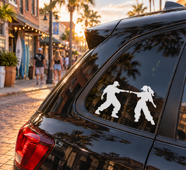 Car window vinyl decal of two dancers posing for a fist bump