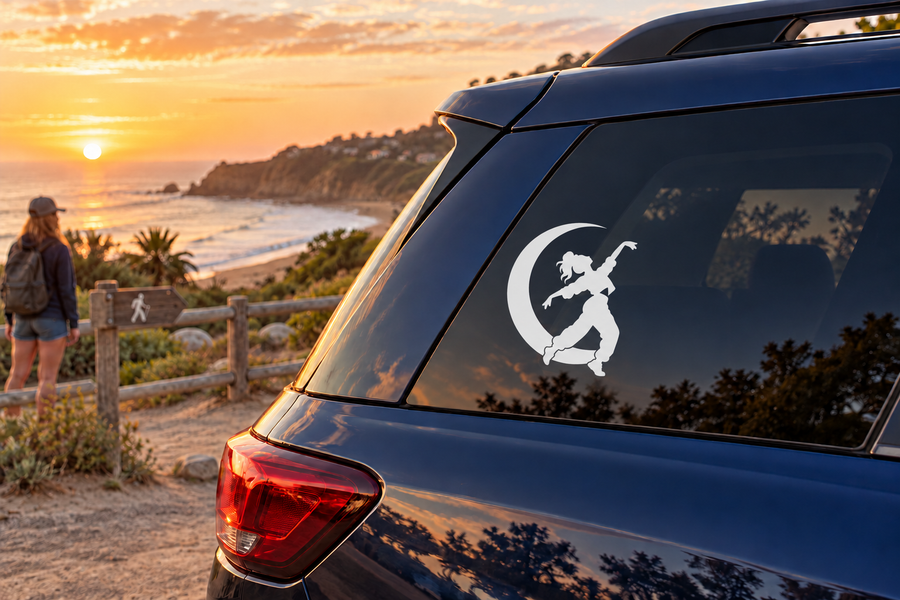 Car window vinyl decal of a dancing silhouette with a crescent moon
