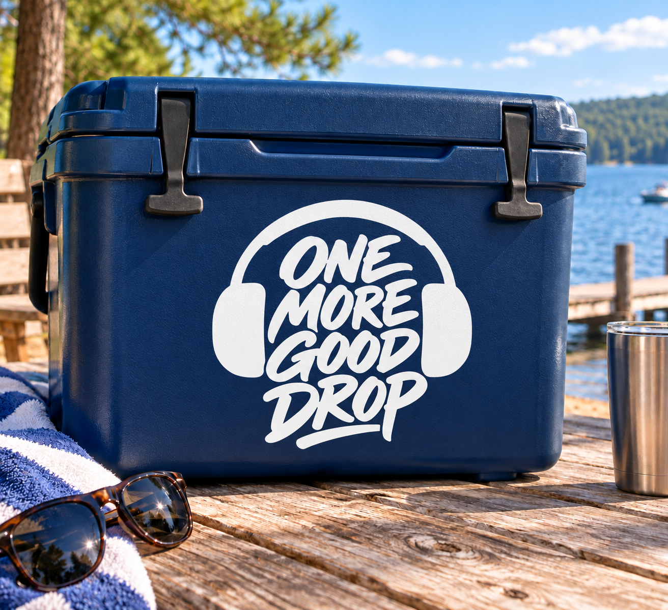 Vinyl decal logo with headphones and white “ONE MORE GOOD DROP” text on blue