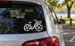 E-bike vinyl decal of white step-through bicycle on window glass