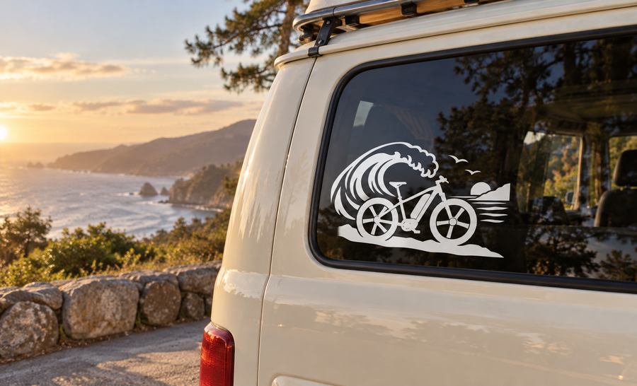 E-bike vinyl decal on window: black wave, bicycle, and coastal scenery graphic
