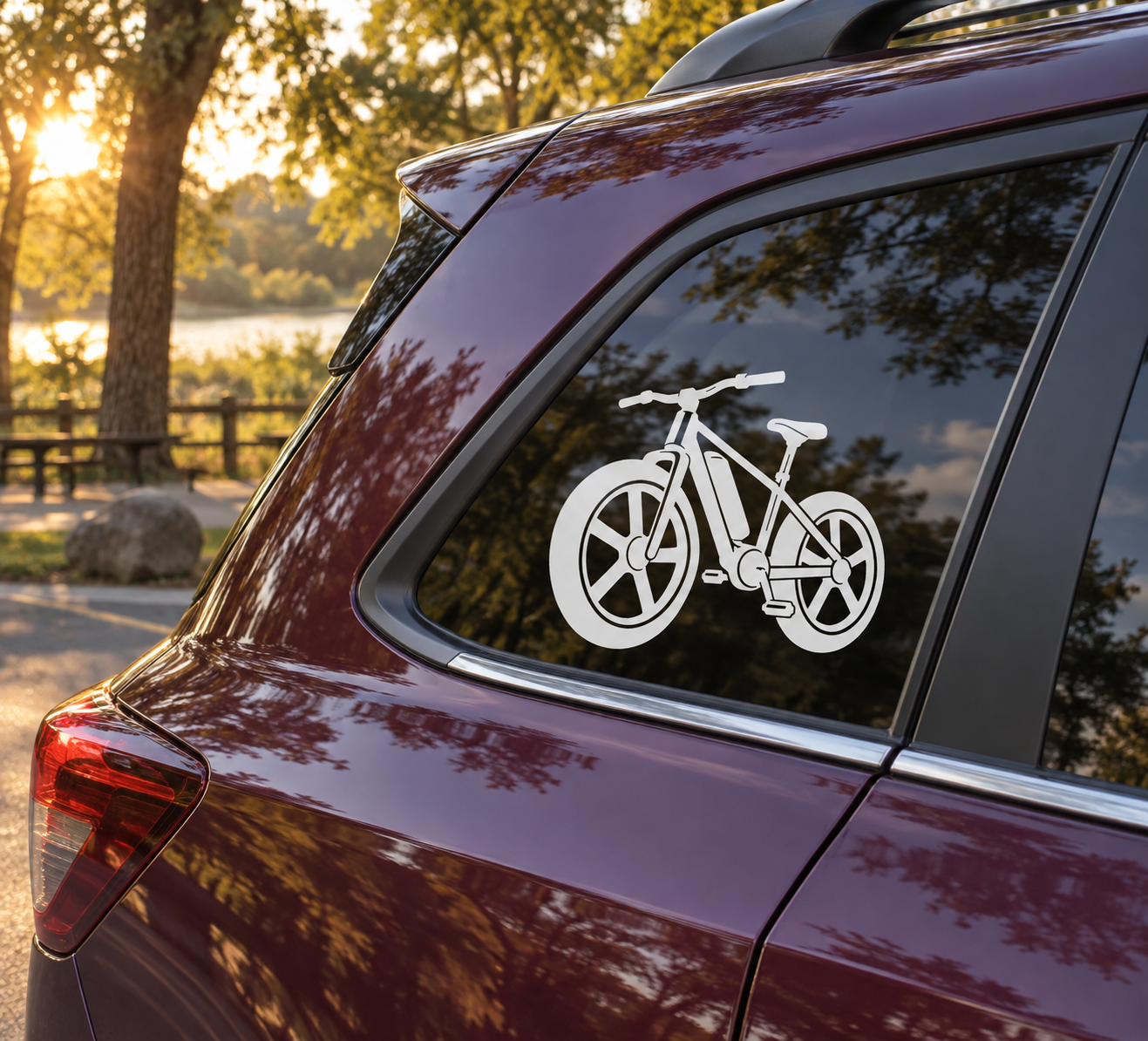 Electric bike front-wheel vinyl decal with white bicycle icon on vehicle window