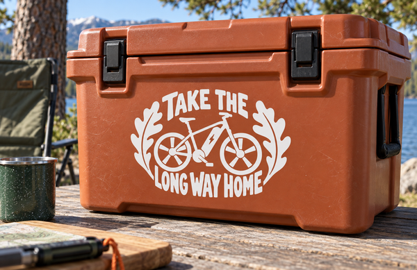 White bicycle vinyl decal reading Take the Long Way Home with winged wheel graphic
