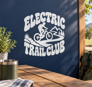 Electric trail club vinyl decal with rider, mountains, and 'ELECTRIC TRAIL CLUB' text