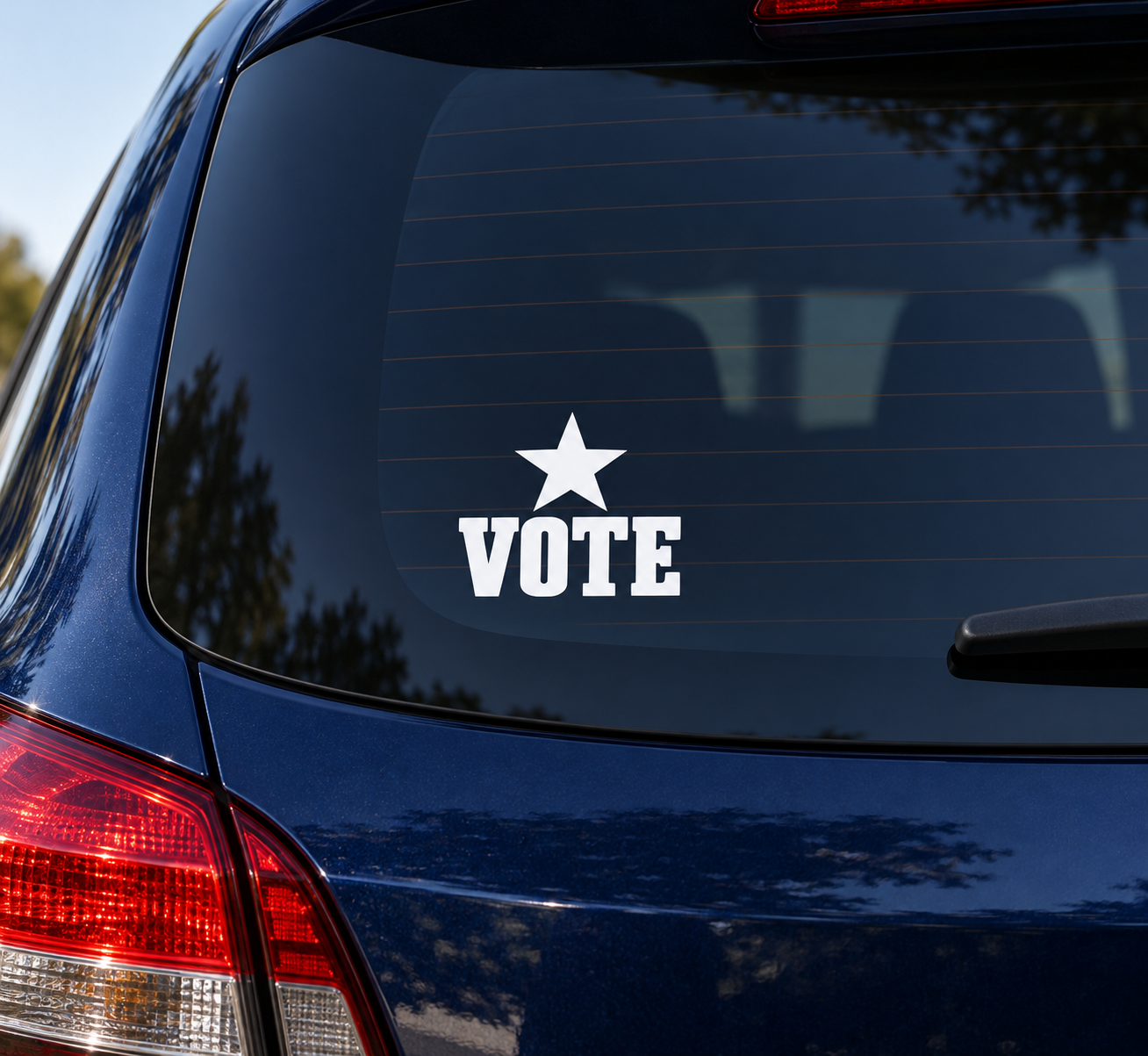 Car vinyl decal: white star with bold 'VOTE' lettering