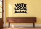 Vote Local vinyl decal with bold black text and city skyline silhouettes